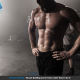 Man standing shirtless with hands on hips